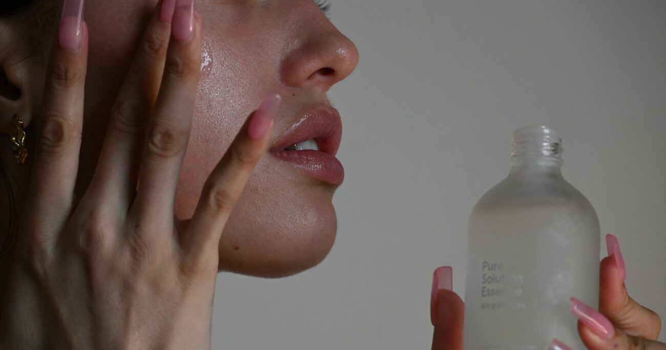 a person holding a bottle