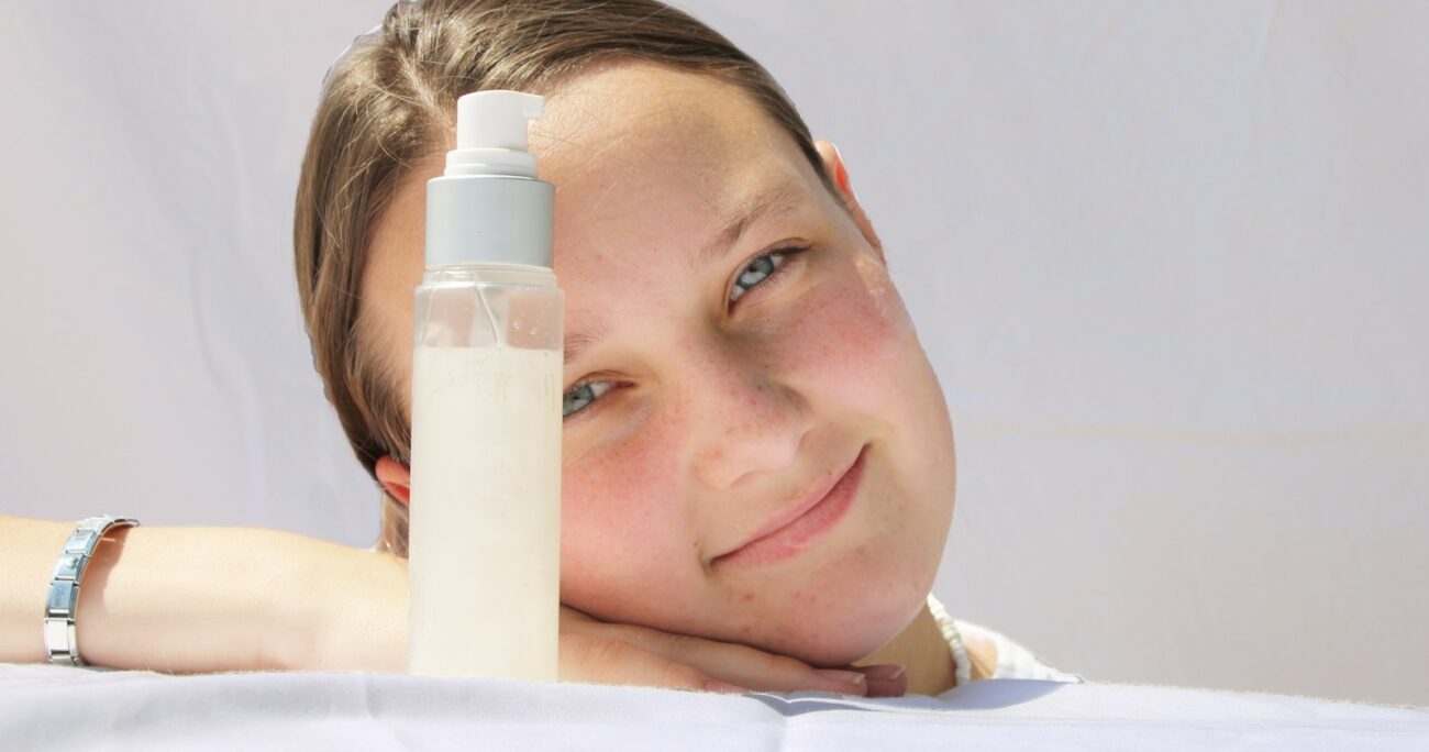 a person with a bottle of water on the head